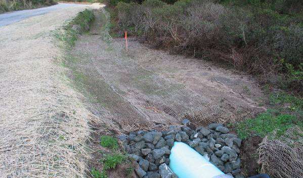 Road repair and new drainage system installation.
